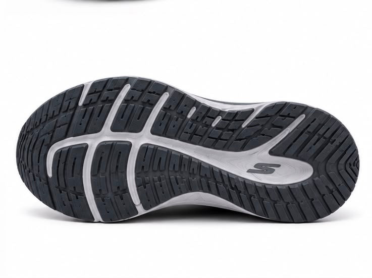 Newstep Propulsion Max Run black slip-on running sneakers with orange detailing