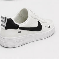 Newstep White Street white men’s casual sneakers with black details